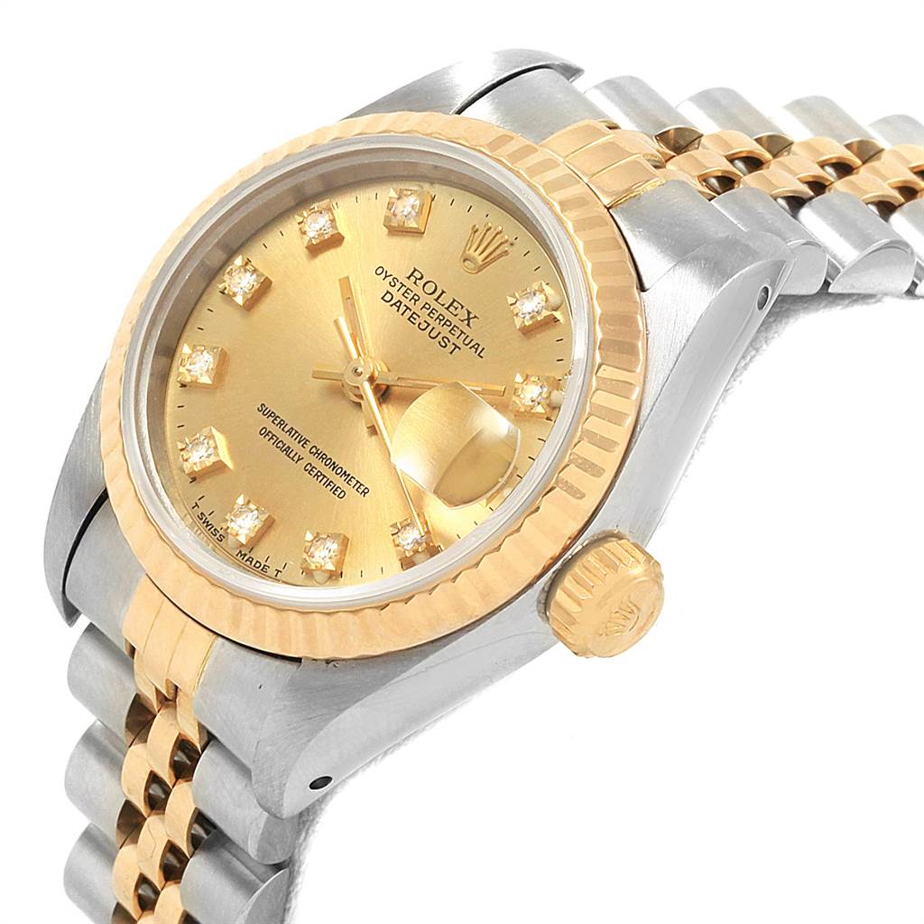 This image shows a Rolex Datejust 69173 Women's Stainless Steel Champagne Dial 69173 Women's Stainless Steel Champagne Dial watch from a slight side angle, highlighting the bezel, crown, and bracelet.