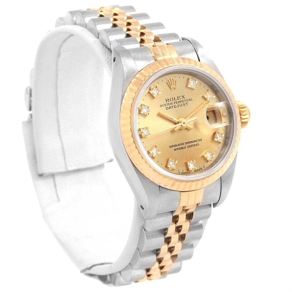 This Rolex Datejust 69173 Women's Stainless Steel Champagne Dial 69173 Women's Stainless Steel Champagne Dial watch is shown at a three-quarter angle, highlighting its gold bezel, dial, and two-tone bracelet.