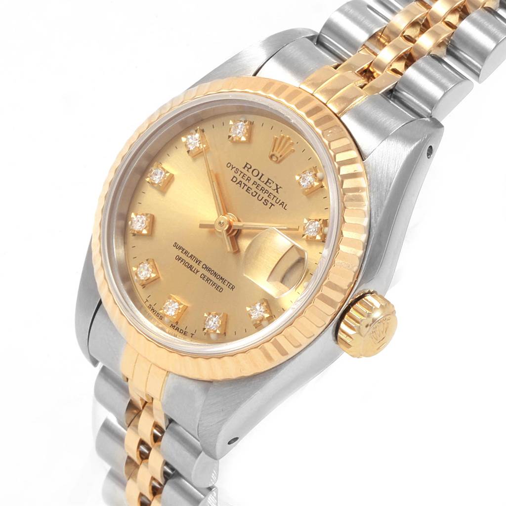 The image shows a close-up, angled view of a Rolex Datejust 69173 Women's Stainless Steel Champagne Dial 69173 Women's Stainless Steel Champagne Dial watch, highlighting its dial, crown, and two-tone bracelet.