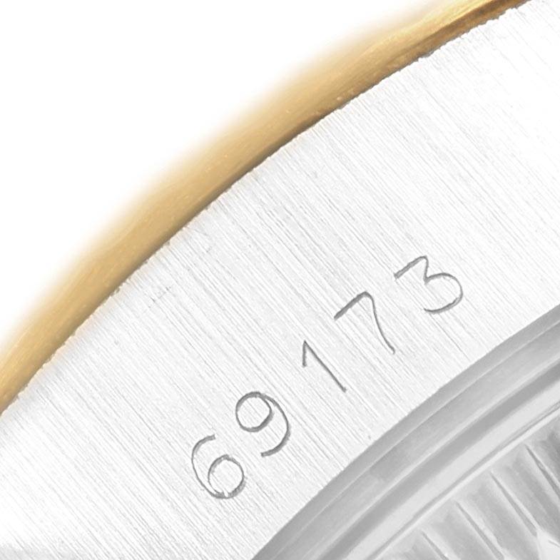 This image shows a close-up of the model number "69173" on the bezel and case back edge of a Rolex Datejust 69173 Women's Stainless Steel Champagne Dial 69173 Women's Stainless Steel Champagne Dial watch.
