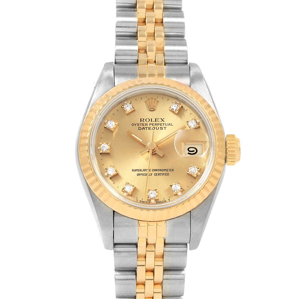 The image shows a frontal view of a Rolex Datejust 69173 Women's Stainless Steel Champagne Dial 69173 Women's Stainless Steel Champagne Dial watch with a champagne dial, fluted bezel, and a two-tone Jubilee bracelet.