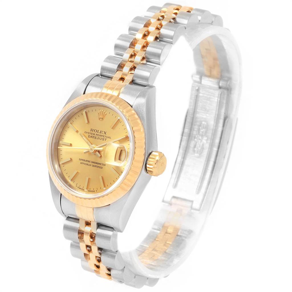 The image shows a side angle of the Rolex Datejust 69173 Women's Stainless Steel Champagne Dial 69173 Women's Stainless Steel Champagne Dial watch, highlighting the gold dial, fluted bezel, and two-tone bracelet.