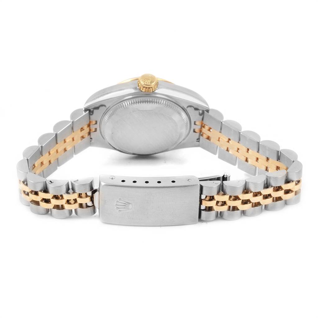 This image shows the Rolex Datejust 69173 Women's Stainless Steel Champagne Dial 69173 Women's Stainless Steel Champagne Dial watch from the case back and bracelet clasp angle.