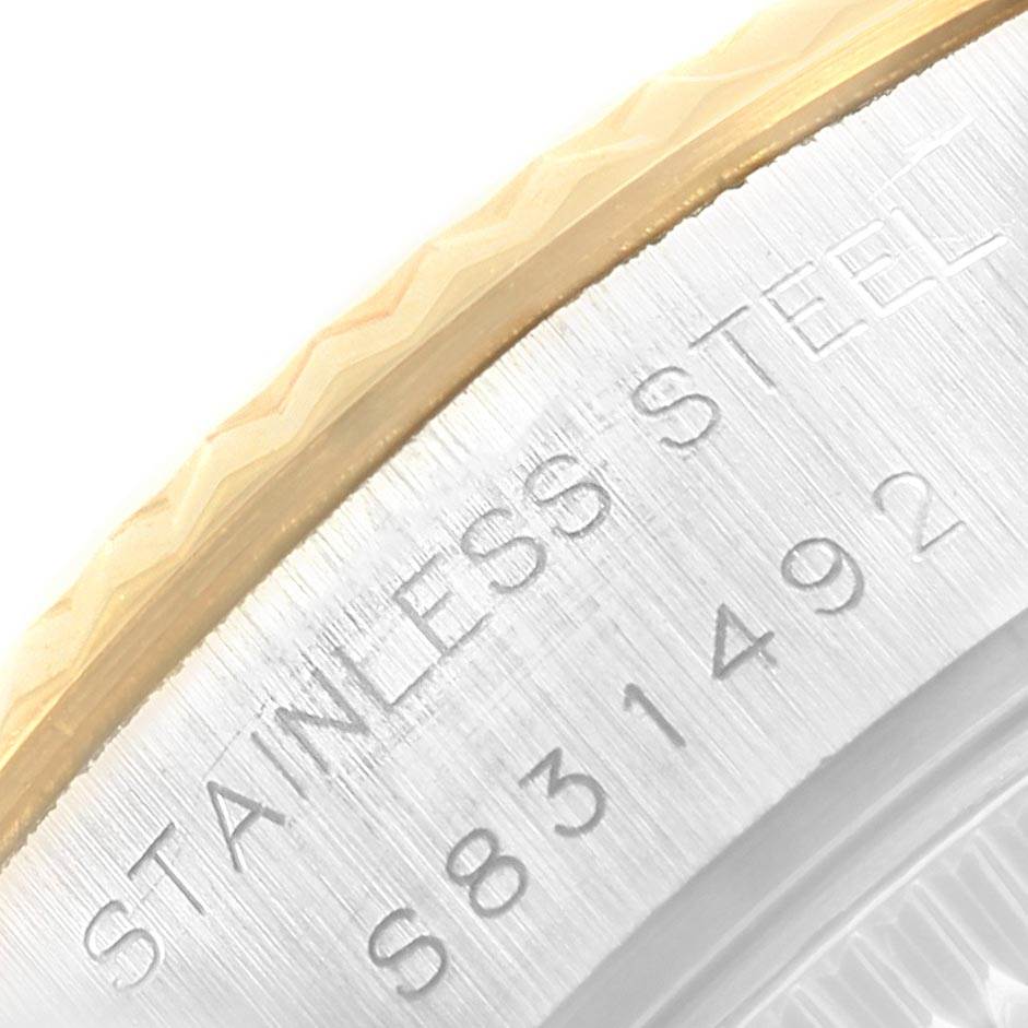 This image shows a close-up of the side engraving on a Rolex Datejust 69173 Women's Stainless Steel Champagne Dial 69173 Women's Stainless Steel Champagne Dial's stainless steel case.