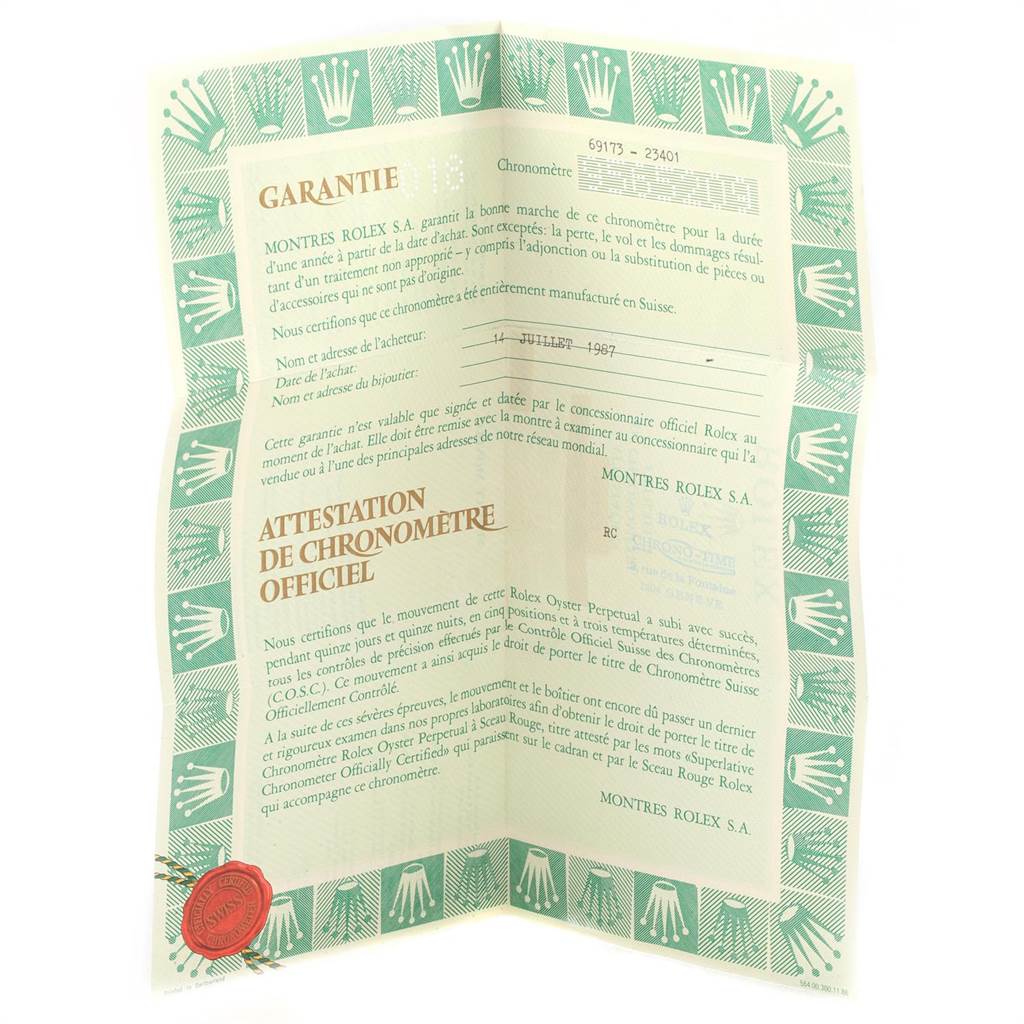 This image shows a warranty certificate for the Rolex Datejust 69173 Women's Stainless Steel White Dial 69173 Women's Stainless Steel White Dial model, displaying official attestation details.