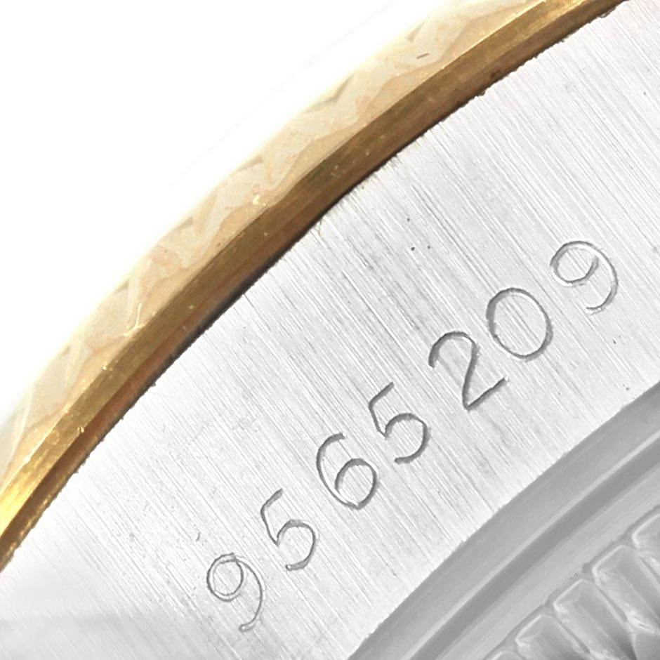 This image shows a close-up of the serial number engraved on the side of a Rolex Datejust 69173 Women's Stainless Steel White Dial 69173 Women's Stainless Steel White Dial model watch.