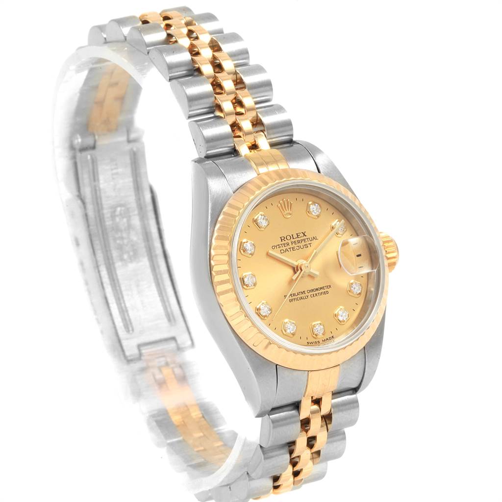 The Rolex Datejust 69173 Women's Stainless Steel Champagne Dial 69173 Women's Stainless Steel Champagne Dial watch is shown at an oblique angle, highlighting its two-tone Jubilee bracelet and gold fluted bezel.
