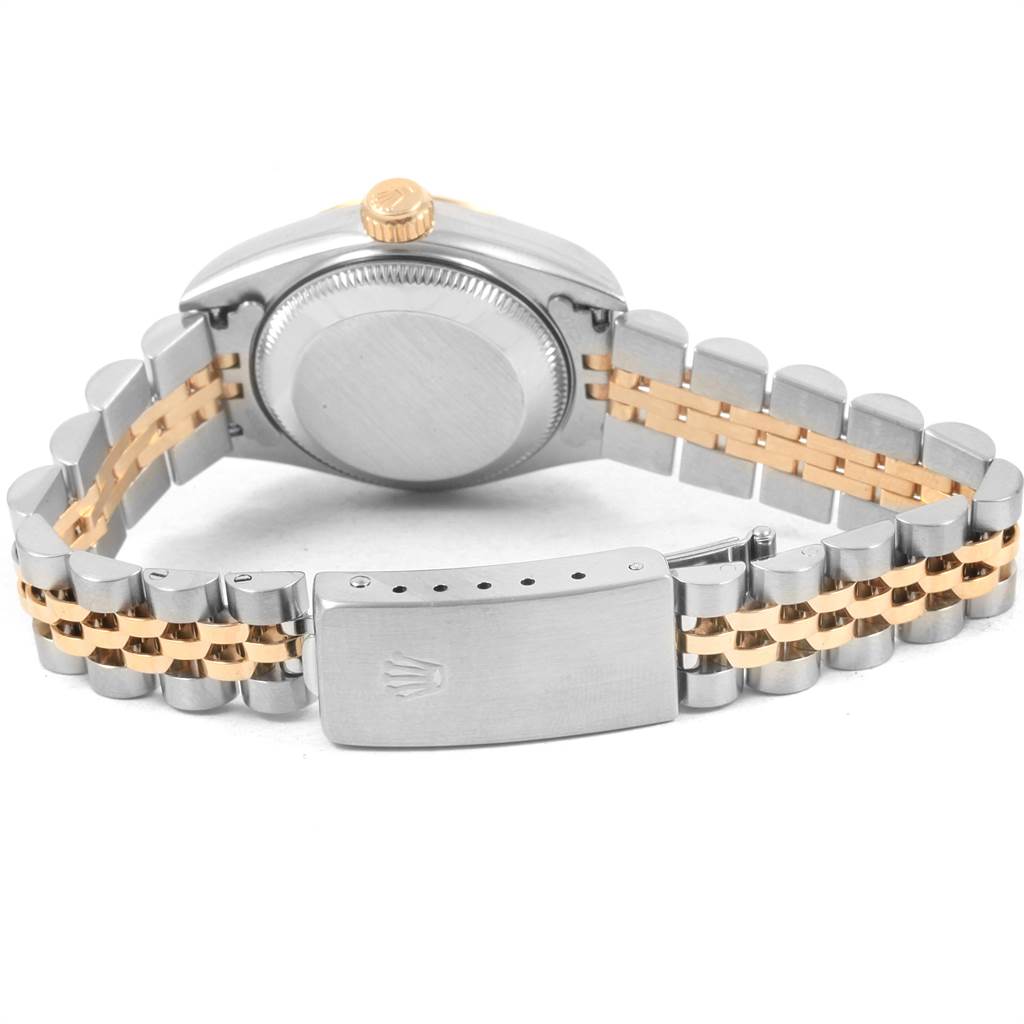 This image shows the back, crown, and bracelet of a Rolex Datejust 69173 Women's Stainless Steel Champagne Dial 69173 Women's Stainless Steel Champagne Dial watch, featuring a two-tone metal design.