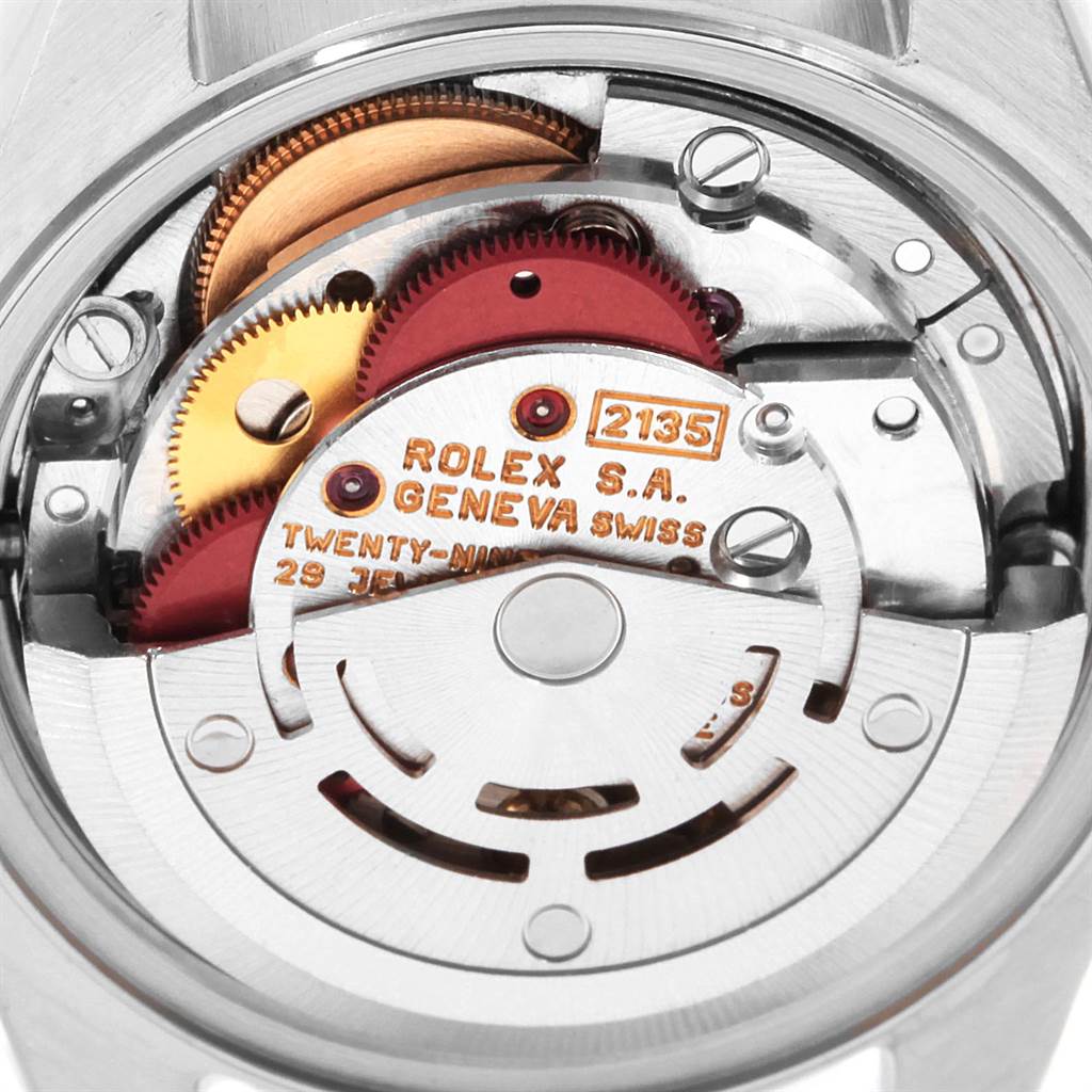 This image shows a close-up view of the movement mechanism inside a Rolex Datejust 69173 Women's Stainless Steel Champagne Dial 69173 Women's Stainless Steel Champagne Dial watch.