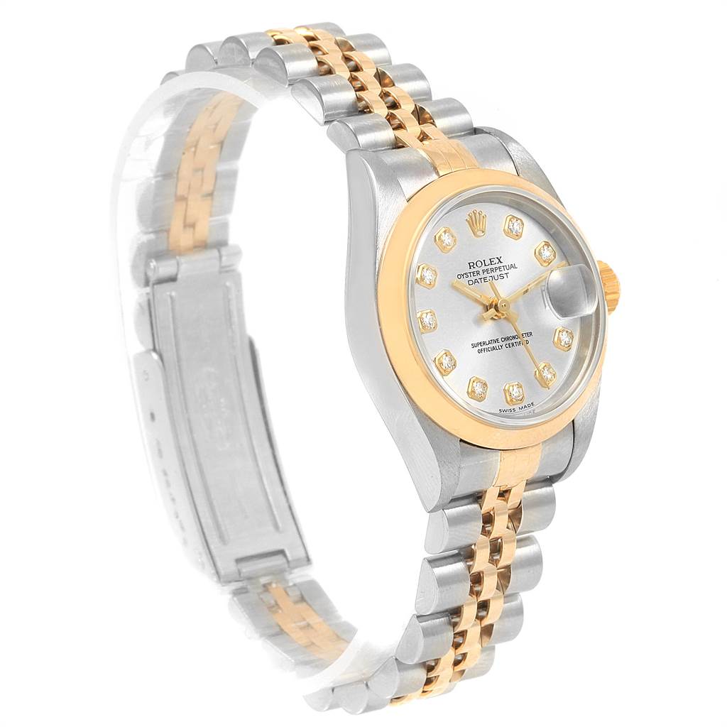 This image shows a side angle of a Rolex Datejust 79163 Women's Steel and Gold (two tone) Silver Dial 79163 Women's Steel and Gold (two tone) Silver Dial watch, highlighting the face, bezel, and two-tone bracelet.
