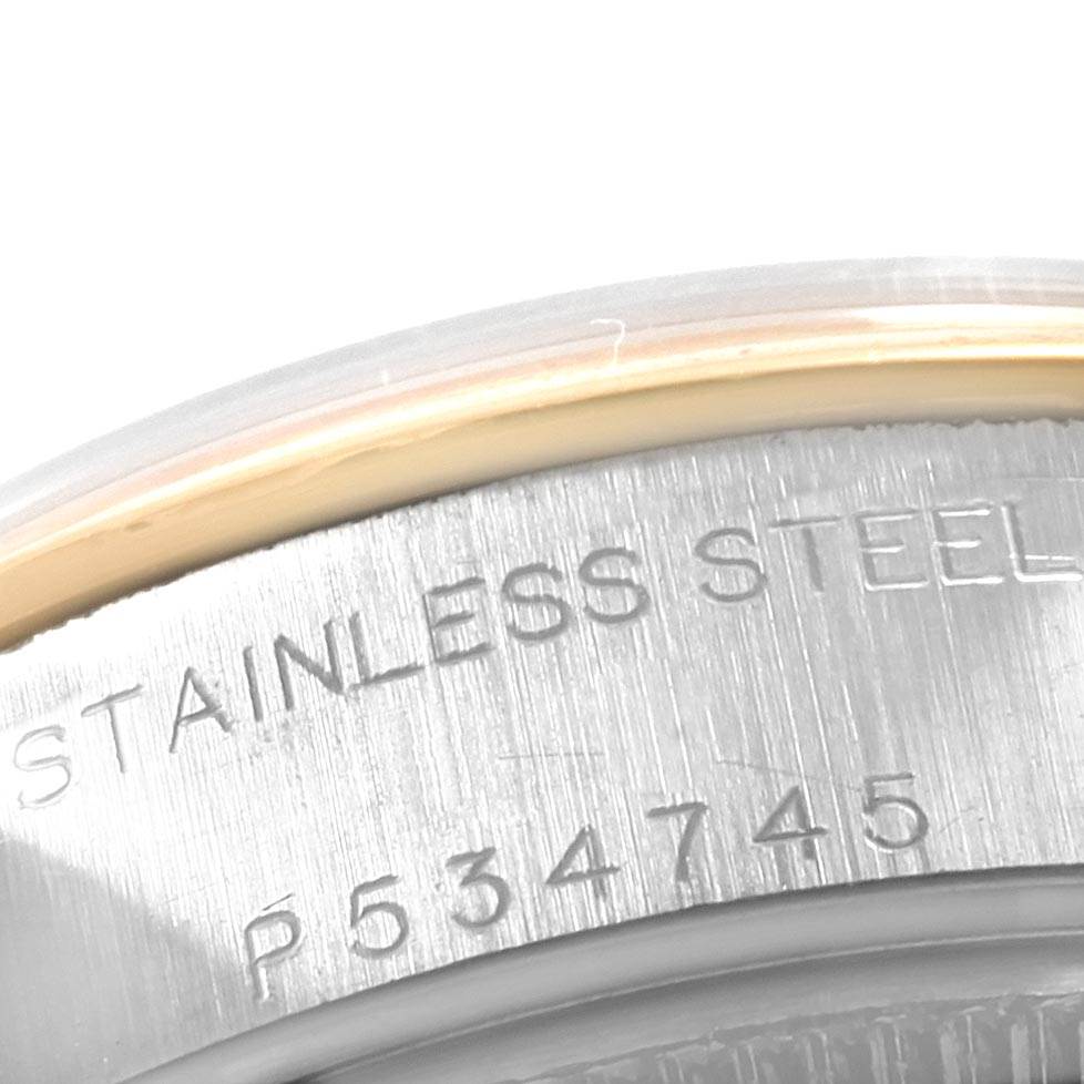 This image shows a close-up of the stainless steel case back with an engraving on a Rolex Datejust 79163 Women's Steel and Gold (two tone) Silver Dial 79163 Women's Steel and Gold (two tone) Silver Dial watch.