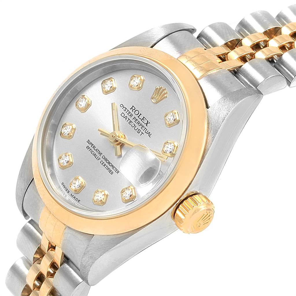 This image shows a close-up angle of the dial, bezel, crown, and part of the bracelet of a Rolex Datejust 79163 Women's Steel and Gold (two tone) Silver Dial 79163 Women's Steel and Gold (two tone) Silver Dial watch.