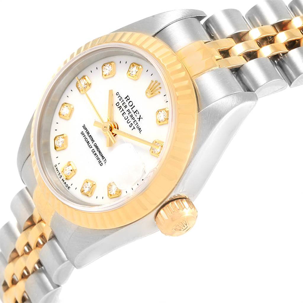 The image shows an angled close-up of a Rolex Datejust 79173 Women's Steel and Gold (two tone) White Dial 79173 Women's Steel and Gold (two tone) White Dial watch, highlighting its dial, crown, and part of the bracelet.