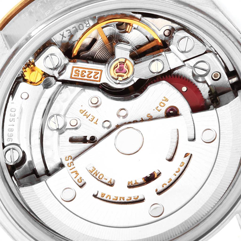 This image shows a close-up view of the movement and intricate mechanisms inside a Rolex Datejust 79173 Women's Steel and Gold (two tone) White Dial 79173 Women's Steel and Gold (two tone) White Dial watch.