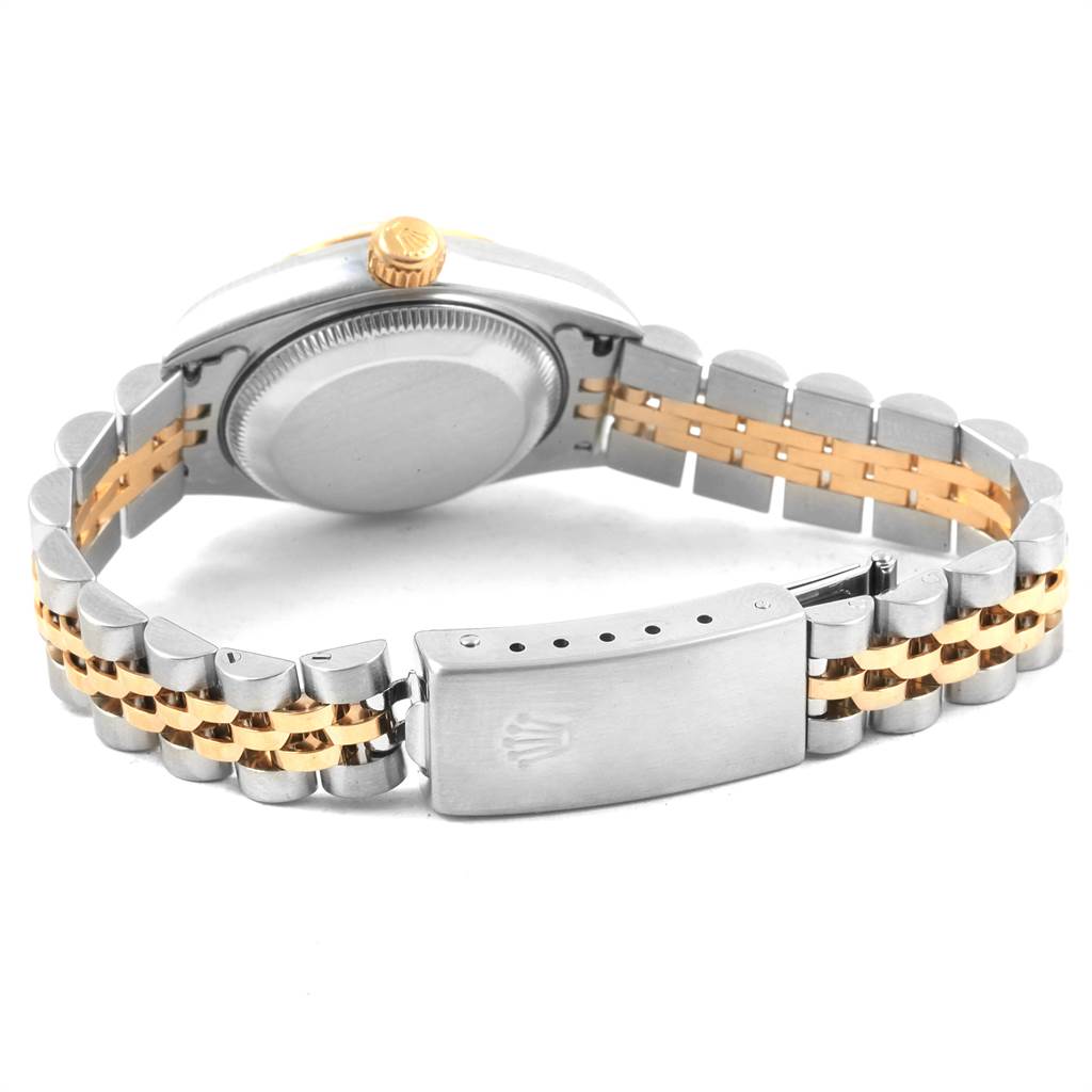 The image shows the back case and bracelet of the Rolex Datejust 79173 Women's Steel and Gold (two tone) White Dial 79173 Women's Steel and Gold (two tone) White Dial, featuring a two-tone metal design with a closed clasp.