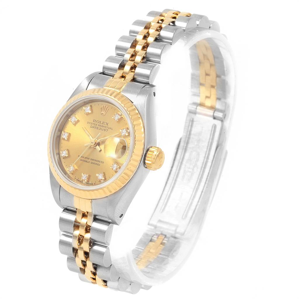 This Rolex Datejust 69173 Women's Stainless Steel Champagne Dial 69173 Women's Stainless Steel Champagne Dial watch is shown at a slight angle, highlighting its gold and silver bracelet, gold dial, and fluted bezel.