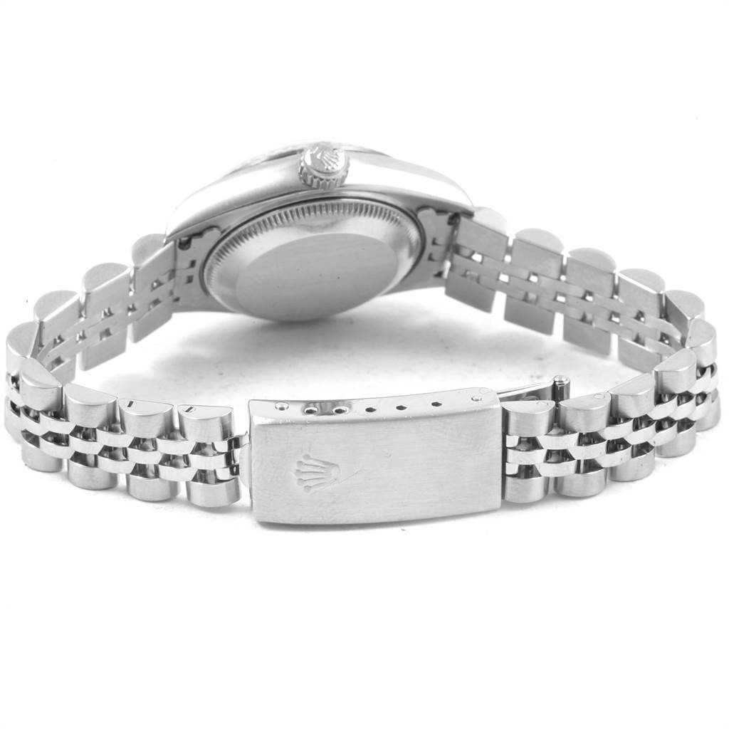 The image shows the Rolex Datejust 69174 Women's Stainless Steel Silver Dial 69174 Women's Stainless Steel Silver Dial watch from the back, highlighting the case, crown, and bracelet clasp.