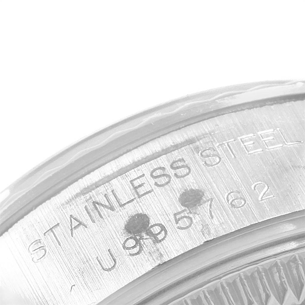 This is a close-up shot showing the stainless steel case back engravings of a Rolex Datejust 69174 Women's Stainless Steel Silver Dial 69174 Women's Stainless Steel Silver Dial watch.