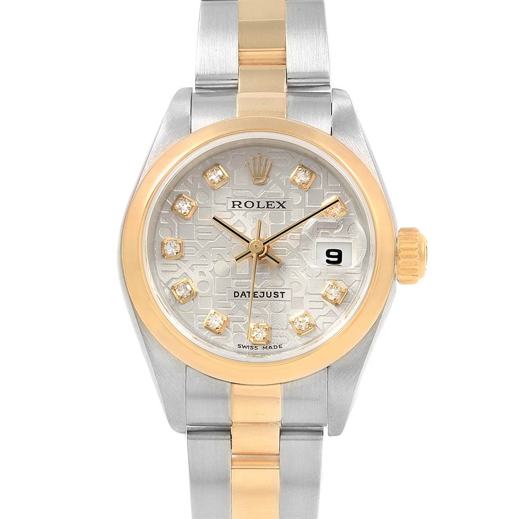 The image shows a front angle view of the Rolex Datejust 79163 Women
s Steel and Gold (two tone) Silver Dial 79163 Women
s Steel and Gold (two tone) Silver Dial watch, displaying the dial, bezel, crown, and a part of the bracelet.