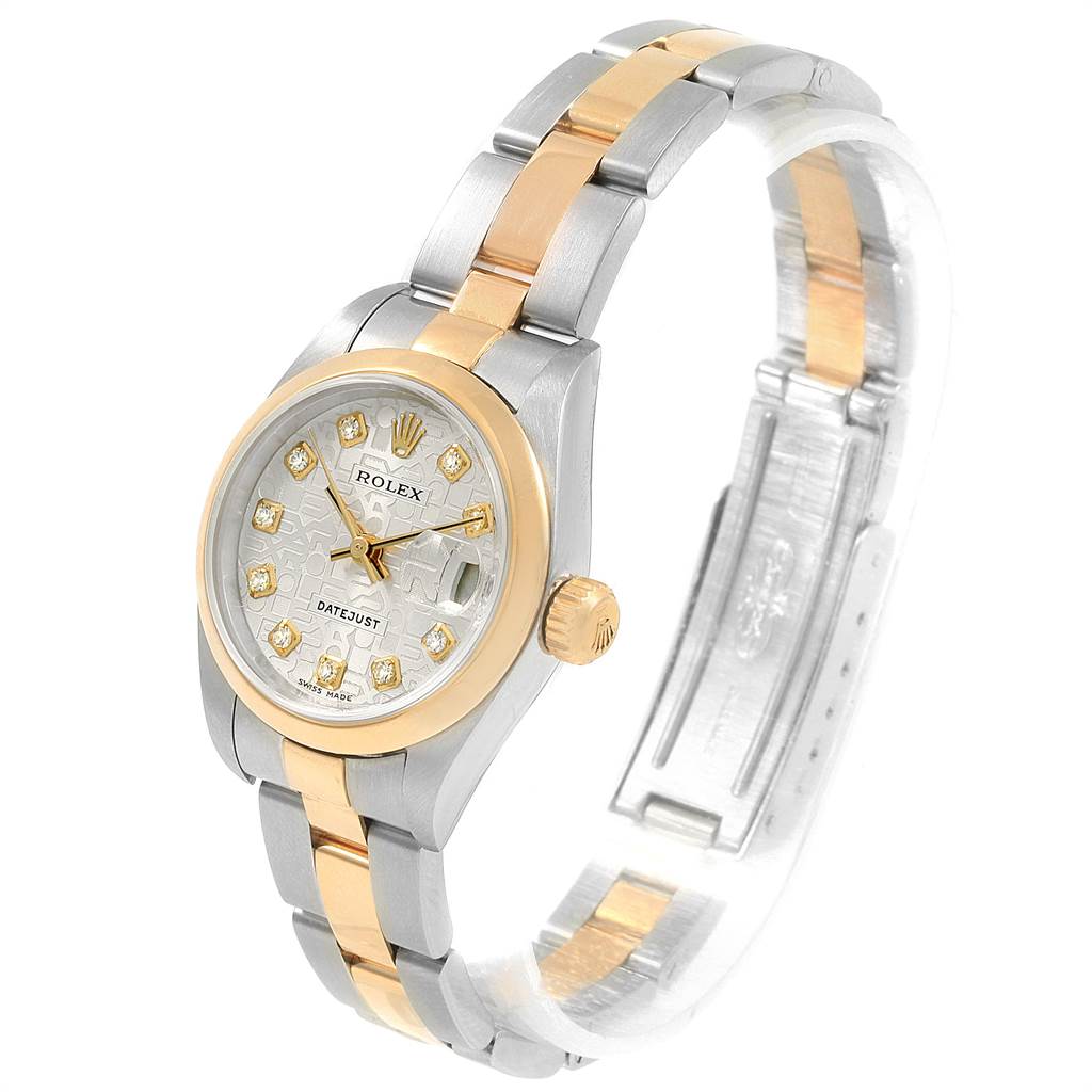 This shows a side-angle view of a Rolex Datejust 79163 Women
s Steel and Gold (two tone) Silver Dial 79163 Women
s Steel and Gold (two tone) Silver Dial watch, highlighting its dial, bezel, crown, and two-tone bracelet.
