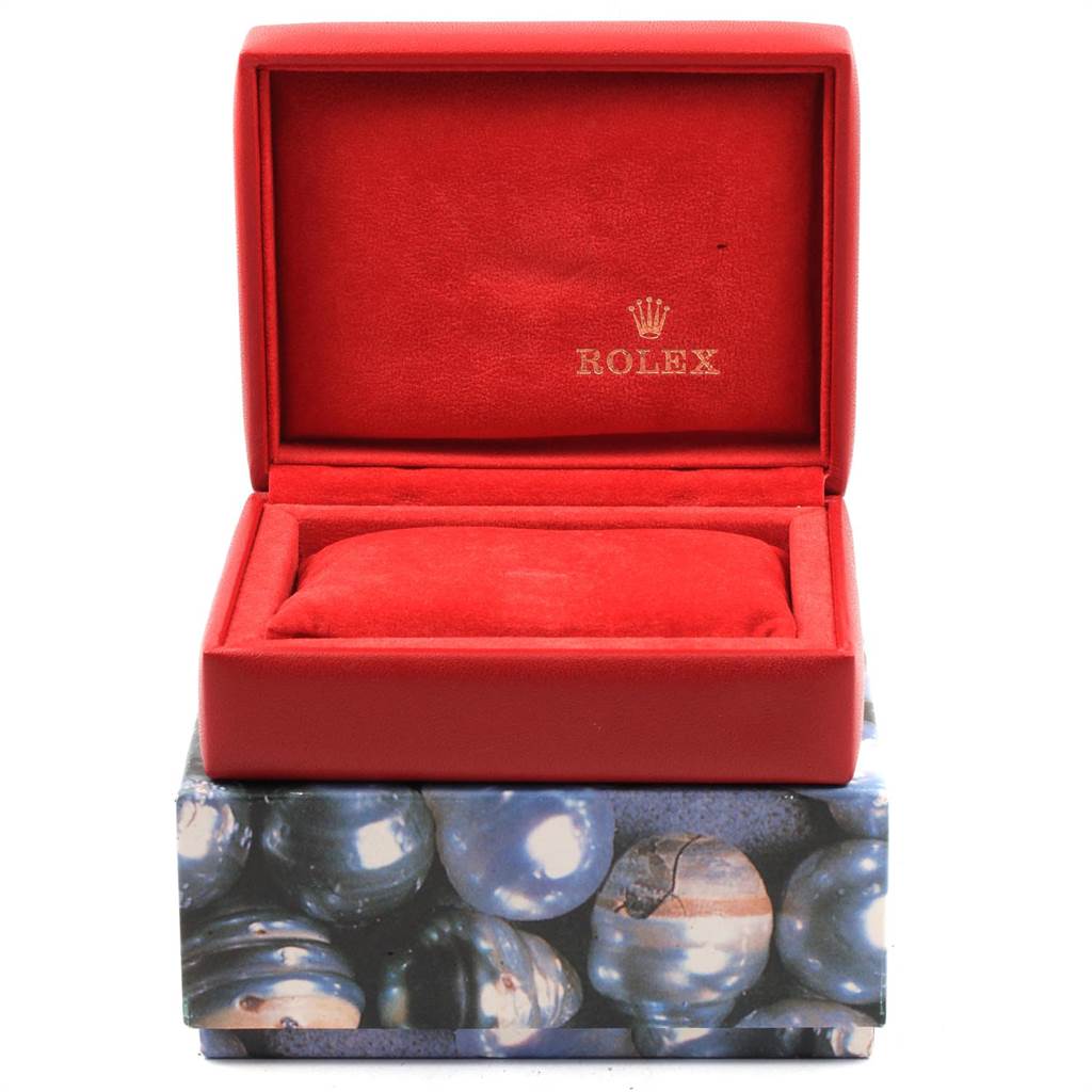 This image shows an open red box for a Rolex Datejust 79163 Women
s Steel and Gold (two tone) Silver Dial 79163 Women
s Steel and Gold (two tone) Silver Dial watch, with a cushioned interior.