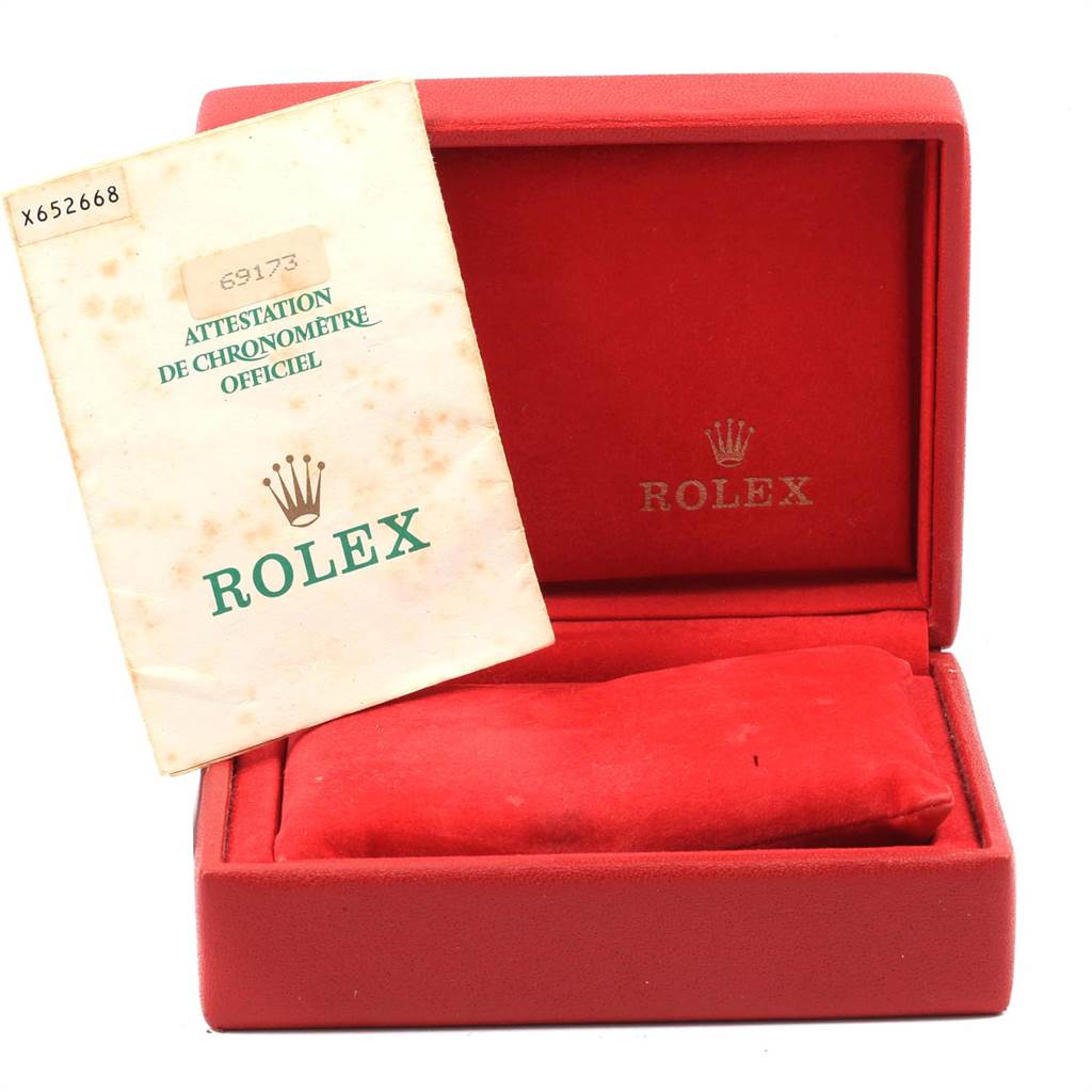 The image shows an empty Rolex Datejust 69173 Women's Stainless Steel White Dial 69173 Women's Stainless Steel White Dial watch box and a certification booklet, both viewed from the front.