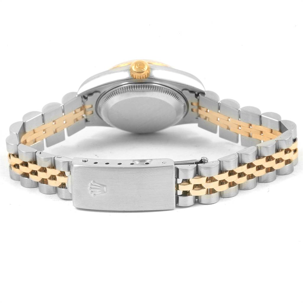 The image shows the back view of a Rolex Datejust 79173 Women's Steel and Gold (two tone) Silver Dial 79173 Women's Steel and Gold (two tone) Silver Dial watch, focusing on the case back, crown, and two-tone bracelet with clasp.