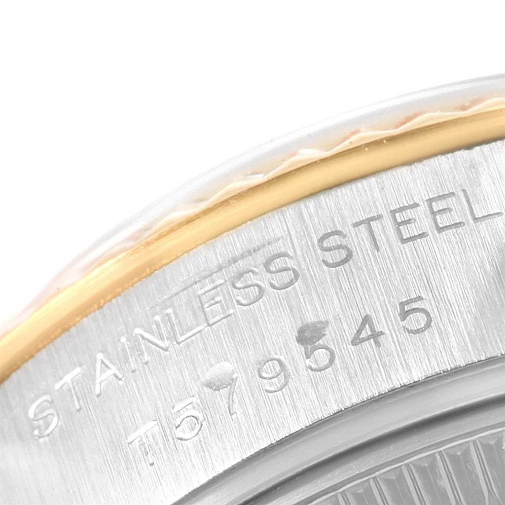 A close-up of the case side of a Rolex Datejust 69173 Women's Stainless Steel White Dial 69173 Women's Stainless Steel White Dial, showing the model number and "STAINLESS STEEL" engraving.