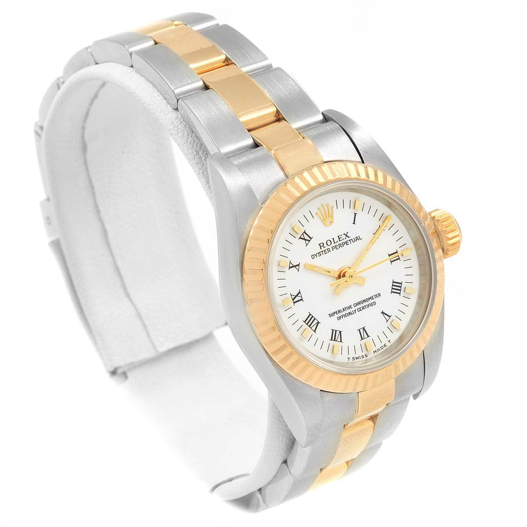The image shows a high-angle view of a Rolex Datejust 69173 Women's Stainless Steel White Dial 69173 Women's Stainless Steel White Dial watch, highlighting its two-tone band, bezel, and dial.