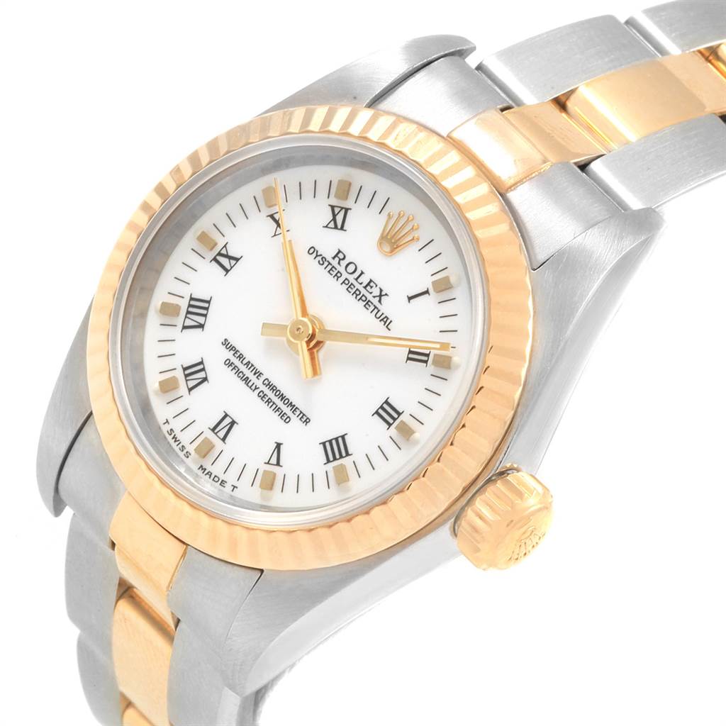 The image shows a top angled view of the Rolex Datejust 69173 Women's Stainless Steel White Dial 69173 Women's Stainless Steel White Dial watch, highlighting the face, bezel, crown, and bracelet.