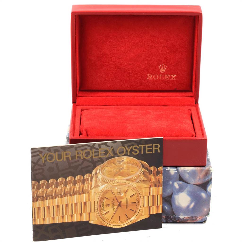 The image shows a Rolex Datejust 79173 Women
s Steel and Gold (two tone) Black Dial 79173 Women
s Steel and Gold (two tone) Black Dial watch box with an informational booklet in front.