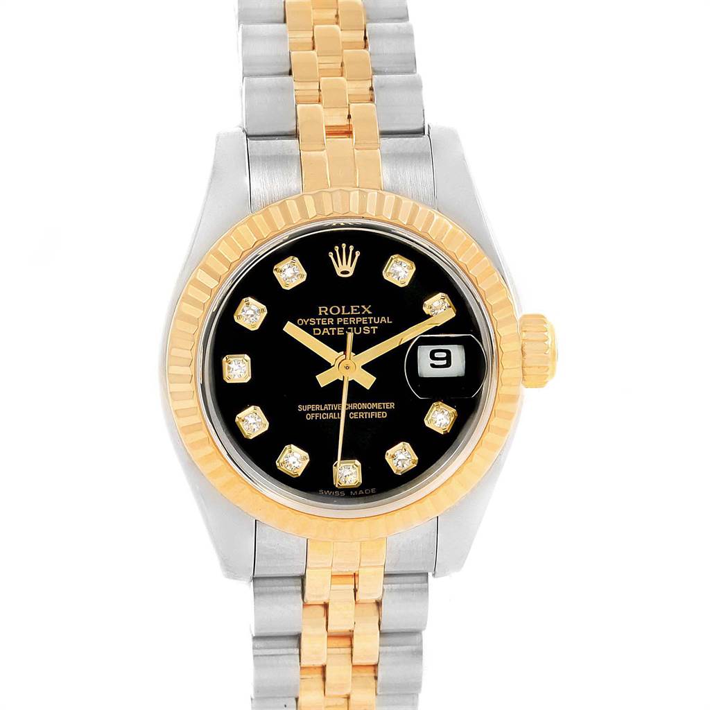 The Rolex Datejust 79173 Women's Steel and Gold (two tone) Black Dial 79173 Women's Steel and Gold (two tone) Black Dial watch is shown from a top-down angle, highlighting its black dial, diamond markers, two-tone bracelet, and fluted bezel.