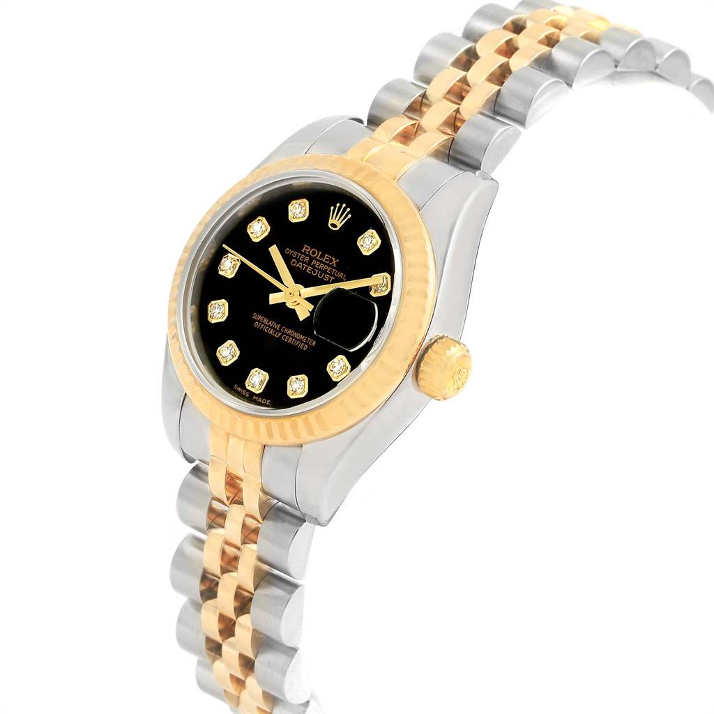 The image shows a Rolex Datejust 79173 Women's Steel and Gold (two tone) Black Dial 79173 Women's Steel and Gold (two tone) Black Dial watch at an angle highlighting the black dial, gold hour markers, bezel, and two-tone bracelet.