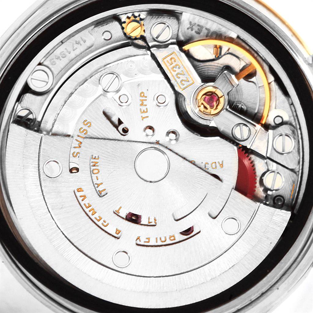 This close-up image shows the intricate movement and internal mechanisms of a Rolex Datejust 79173 Women's Steel and Gold (two tone) Black Dial 79173 Women's Steel and Gold (two tone) Black Dial watch.