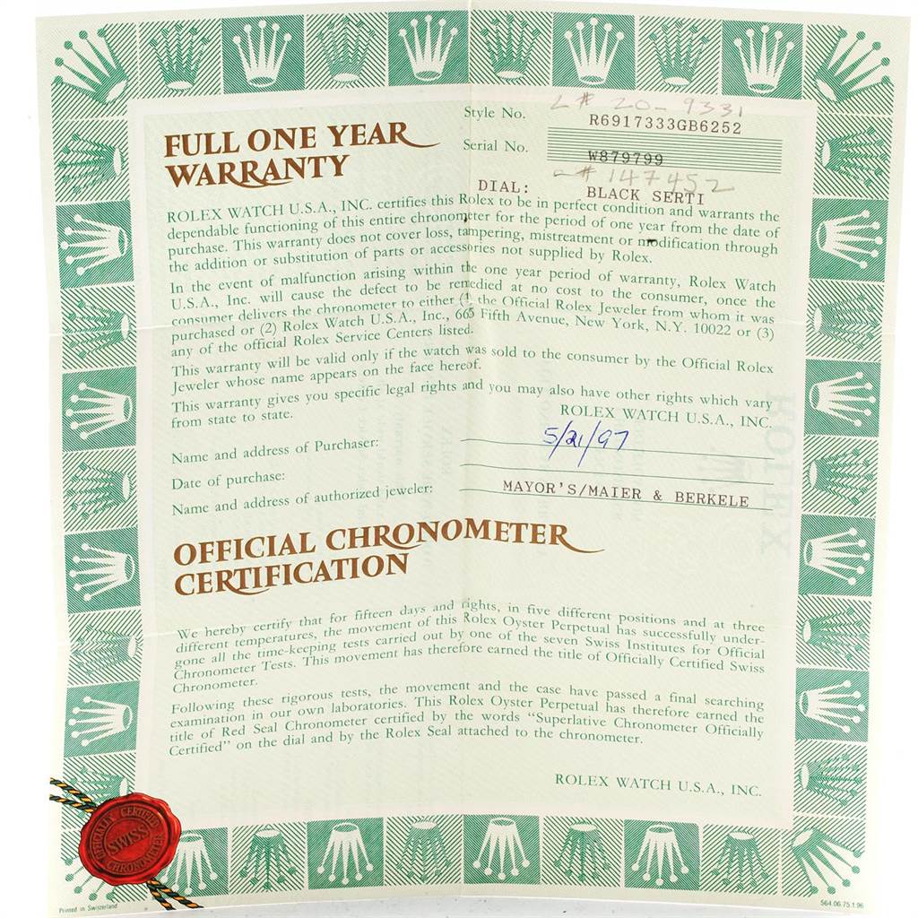 The image shows a warranty card and official chronometer certification for the Rolex Datejust 69173 Women's Stainless Steel Black Dial 69173 Women's Stainless Steel Black Dial model.