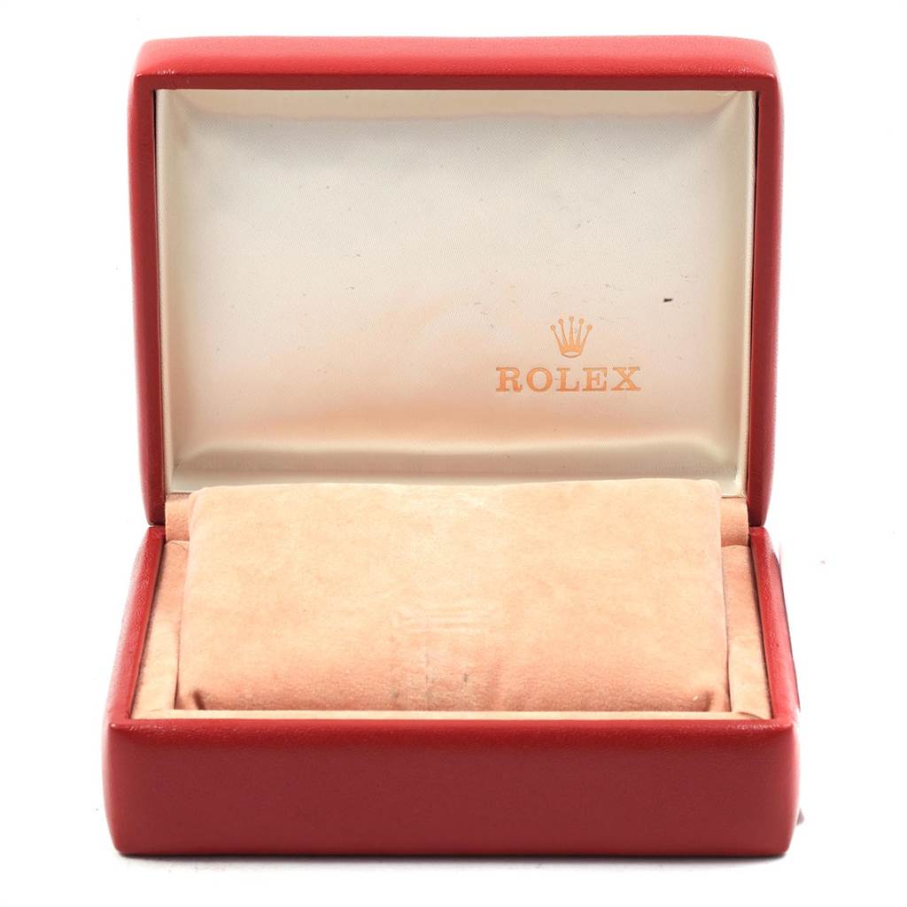 This image shows an open red Rolex watch box for the Datejust model.