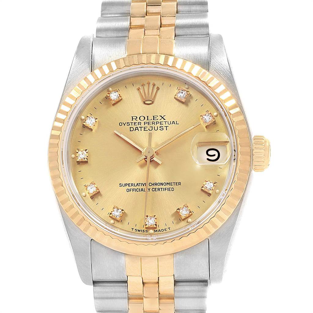 This image shows a front view of a Rolex Datejust 68273 Women's Steel and Gold (two tone) Champagne Dial 68273 Women's Steel and Gold (two tone) Champagne Dial watch featuring a gold dial, gold fluted bezel, and a two-tone bracelet.
