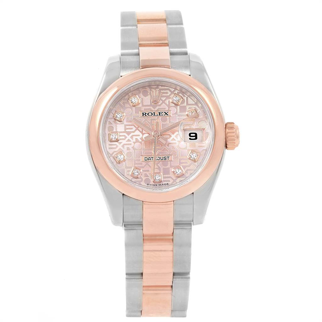The image shows a frontal view of a Rolex Datejust 179161 Women's Steel and Gold (two tone) Pink Dial 179161 Women's Steel and Gold (two tone) Pink Dial watch, featuring a two-tone metal strap and a patterned dial.