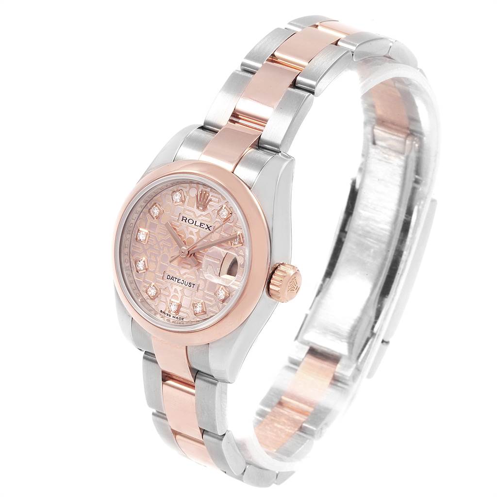 The Rolex Datejust 179161 Women's Steel and Gold (two tone) Pink Dial 179161 Women's Steel and Gold (two tone) Pink Dial watch is shown at an angled top view, highlighting its pink dial, rose gold details, and two-tone bracelet.