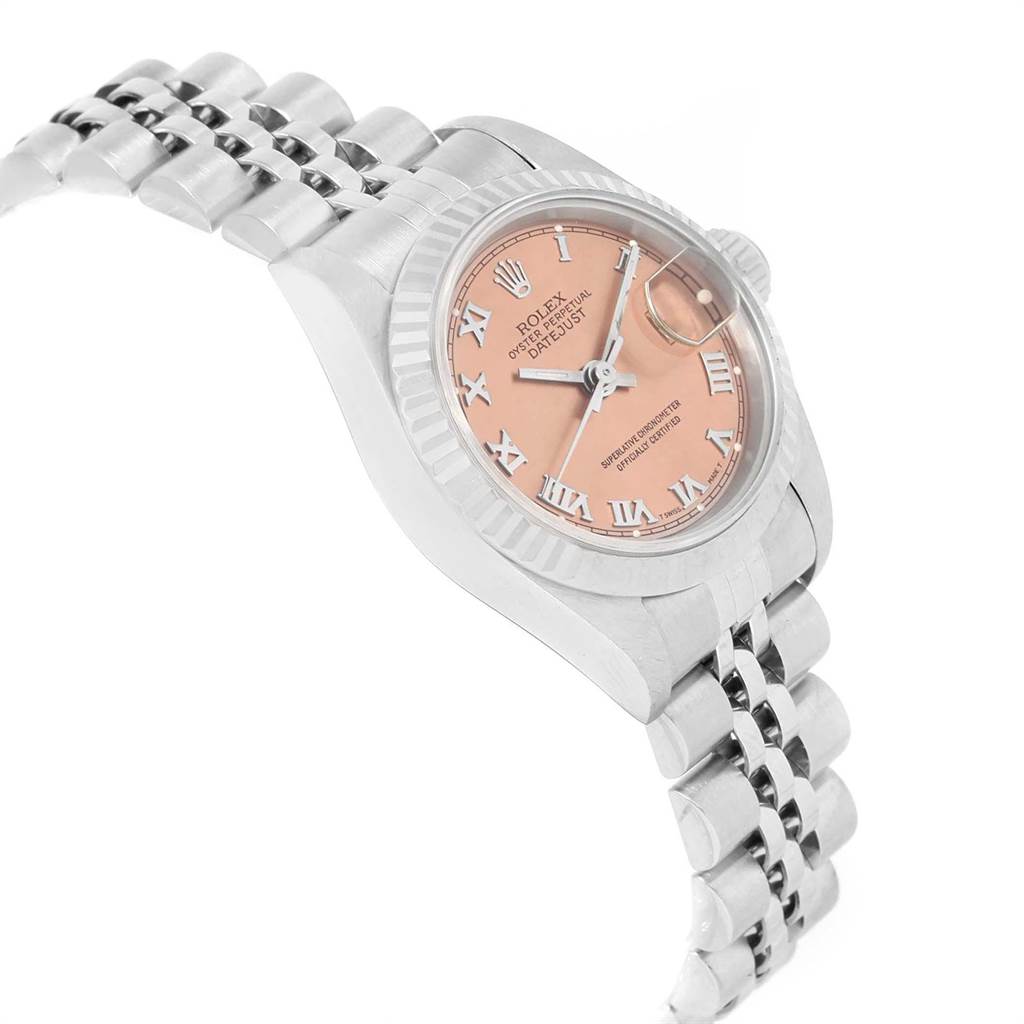 This Rolex Datejust 69174 Women's Stainless Steel Pink Dial 69174 Women's Stainless Steel Pink Dial watch is shown at an angle highlighting its face, bracelet, and part of the bezel.