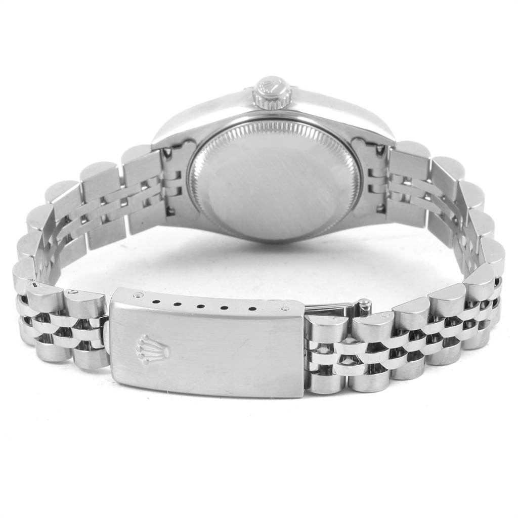 The image shows the back, crown, and bracelet clasp of a Rolex Datejust 79174 Women's Stainless Steel Silver Dial 79174 Women's Stainless Steel Silver Dial watch.