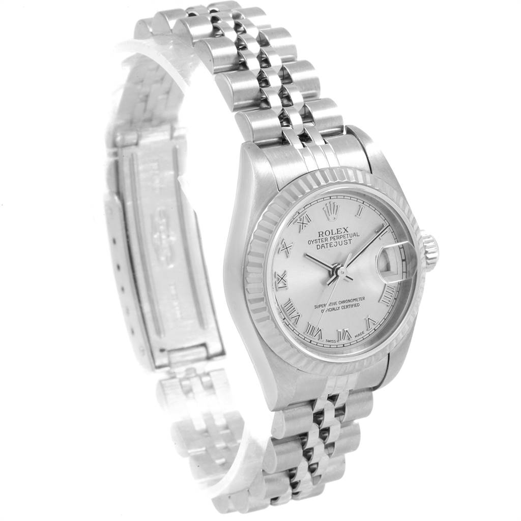 This image shows a Rolex Datejust 79174 Women's Stainless Steel Silver Dial 79174 Women's Stainless Steel Silver Dial watch from a three-quarter angle, highlighting the face, bezel, and Jubilee bracelet.