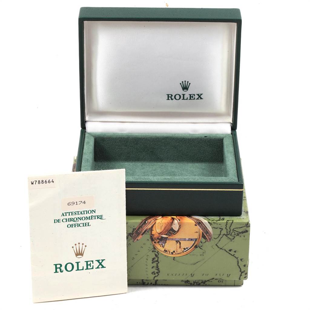 The image shows an empty Rolex Datejust 69174 Women
s Stainless Steel Blue Dial 69174 Women
s Stainless Steel Blue Dial watch box, its outer packaging, and documentation.