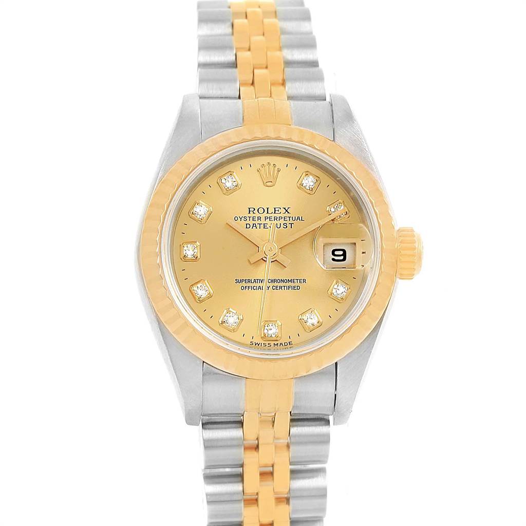 This image shows a Rolex Datejust 79173 Women's Stainless Steel Champagne Dial 79173 Women's Stainless Steel Champagne Dial watch from a front angle, featuring its two-tone bracelet, gold bezel, and a date window at 3 o'clock.