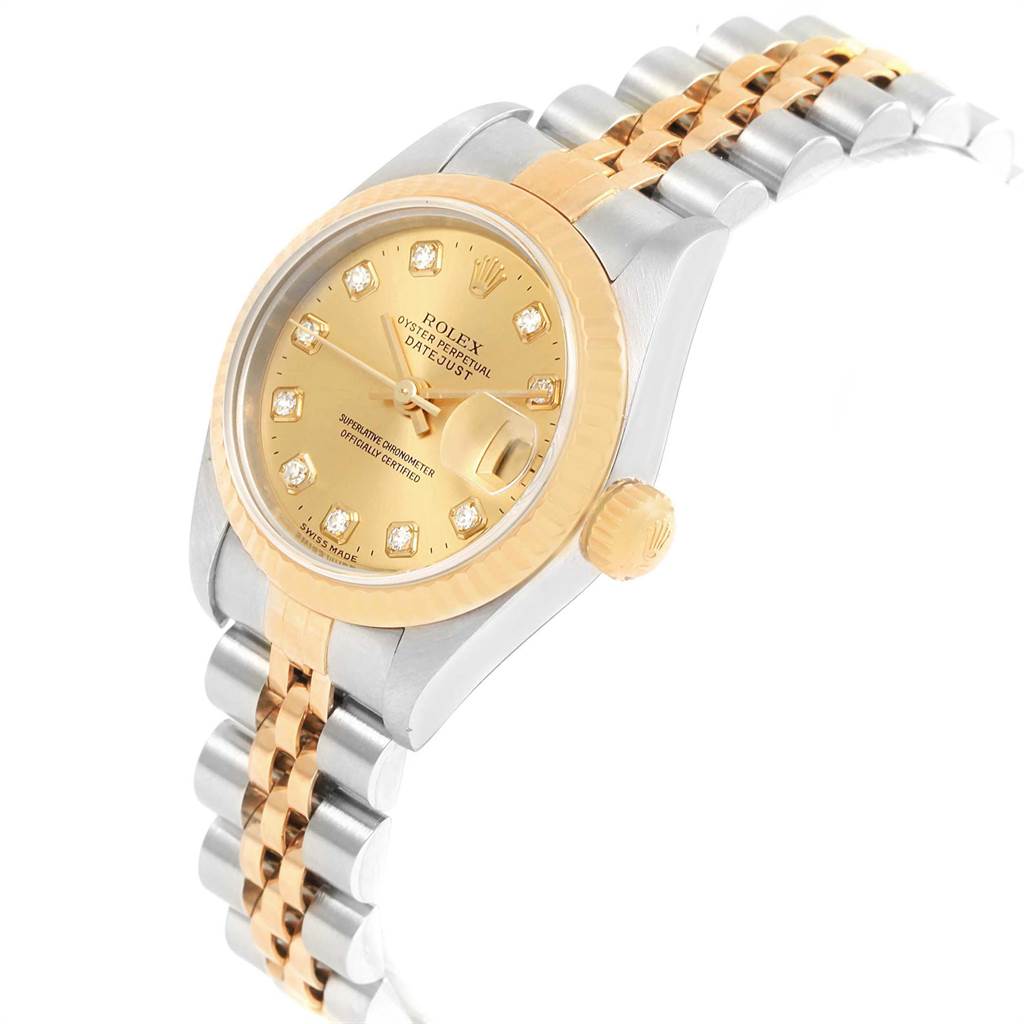 The image shows a Rolex Datejust 79173 Women's Stainless Steel Champagne Dial 79173 Women's Stainless Steel Champagne Dial watch from an angled view, highlighting its gold dial, two-tone bezel, crown, and Jubilee bracelet.