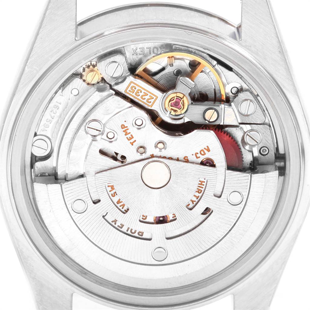 The image shows the Rolex Datejust 79174 Women
s Stainless Steel Pink Dial 79174 Women
s Stainless Steel Pink Dial watch
s movement mechanism from a top-down angle.