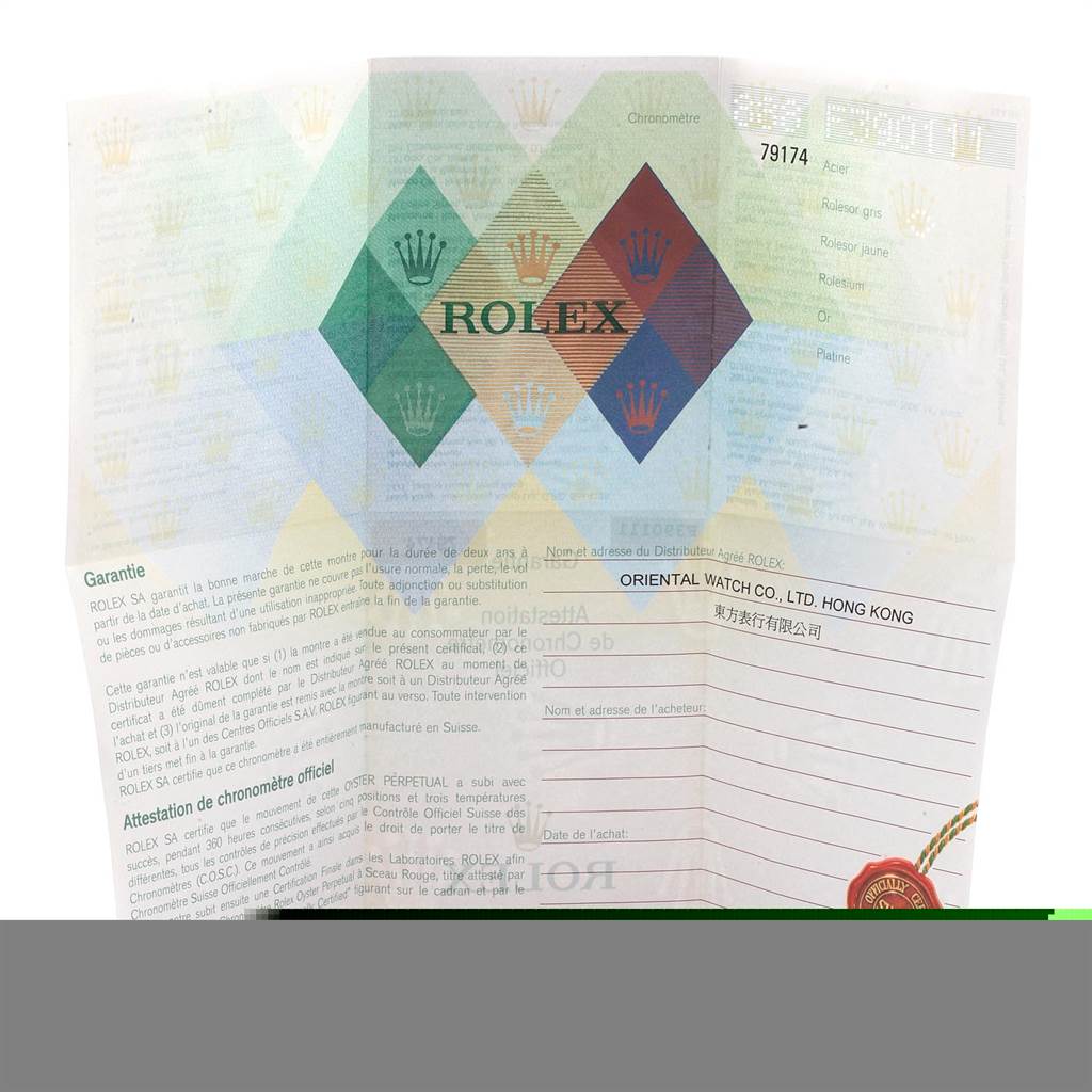 This image shows a warranty card for a Rolex Datejust 79174 Women
s Stainless Steel Pink Dial 79174 Women
s Stainless Steel Pink Dial, displaying documentation and the Rolex logo.