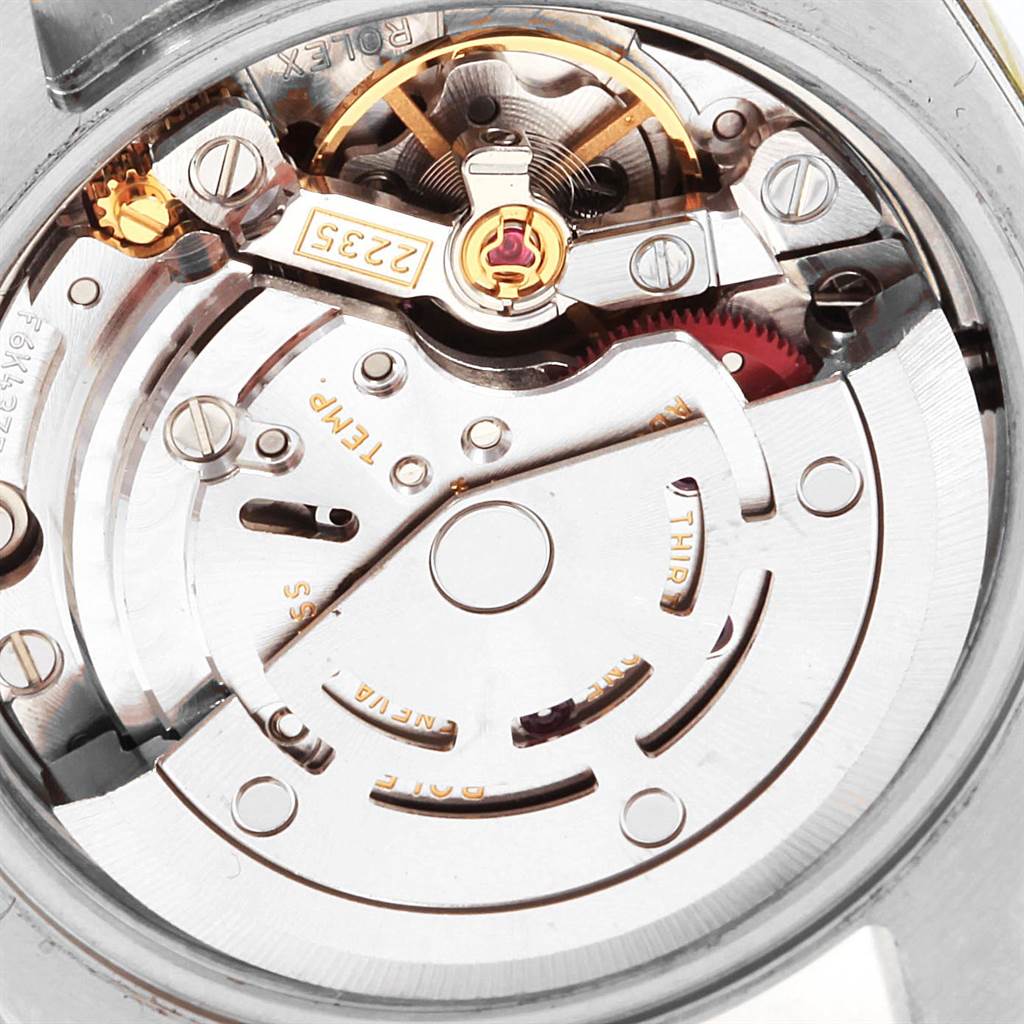 The image shows a close-up of the movement and internal mechanism of a Rolex Datejust 179383 Women
s Steel and Gold (two tone) Silver Dial 179383 Women
s Steel and Gold (two tone) Silver Dial watch from a rear angle.