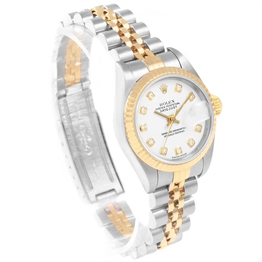 The image shows a Rolex Datejust 79173 Women's Steel and Gold (two tone) White Dial 79173 Women's Steel and Gold (two tone) White Dial watch from an angled perspective, highlighting its face, bezel, and two-tone bracelet.