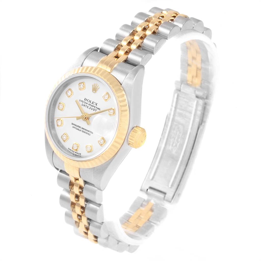 The image shows a side profile of a Rolex Datejust 79173 Women's Steel and Gold (two tone) White Dial 79173 Women's Steel and Gold (two tone) White Dial watch, highlighting the face, bezel, crown, and two-tone bracelet.